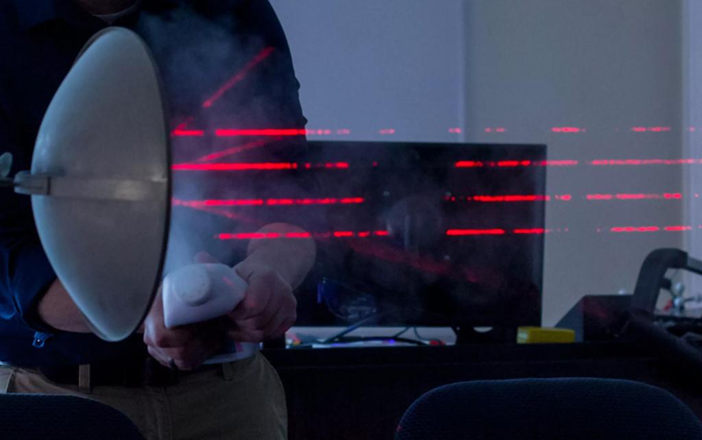 Student working with lasers