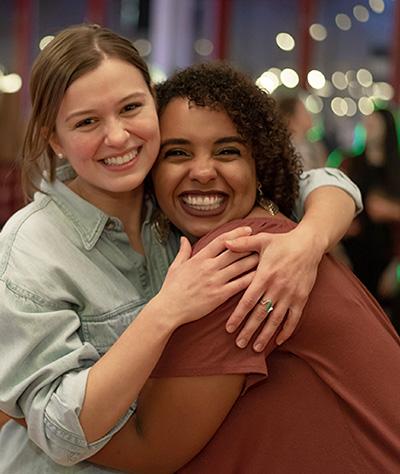 Two women hugging